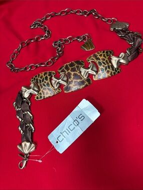 Chico’s M/L giraffe printed metal belt. NWT!!
